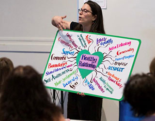 woman giving workshop on healthy relationships